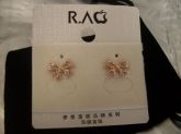 Brinco Lacinho Banhado a Ouro Rose 18k